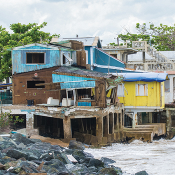 Above a stock photo shows damage from Hurricane Maria which was so strong it snapped cement poles like matchsticks said Dr Lozada Image by iStock