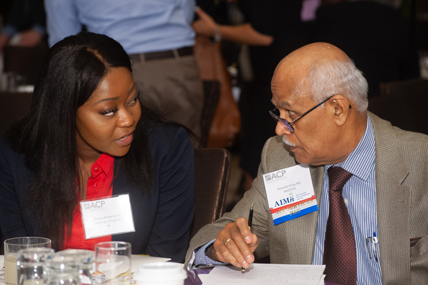 ACP Medical Student Member Bellony N Nzemenoh left and Kesavan Kutty MD MACP of the ACP Wisconsin Chapter have a meeting of the minds before meeting with legislators Photo by James Tkatch